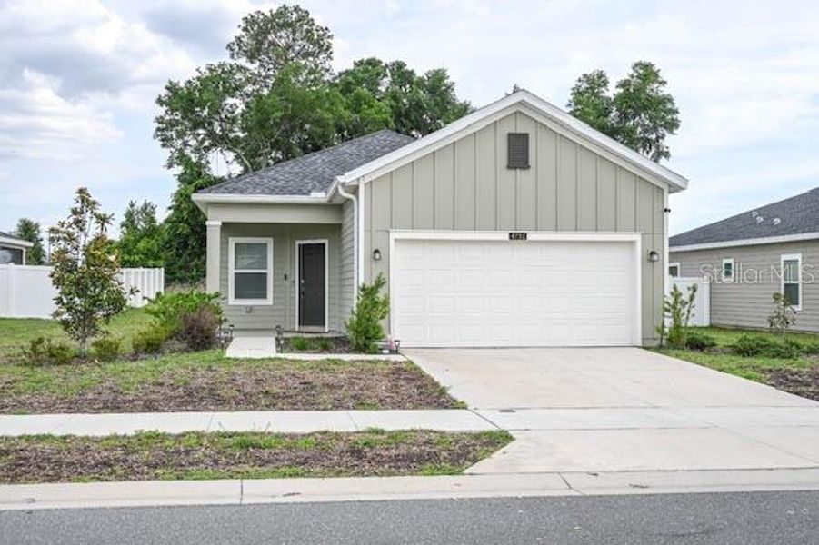 Front exterior of a new home in , Ocala, FL, highlighting curb appeal (Image 1). Front exterior of a new home in , Ocala, FL, highlighting curb appeal (Image 1).