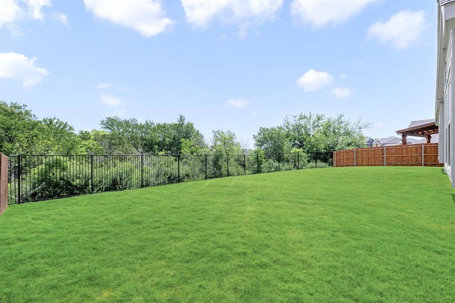 Exterior details and patio area of a home in Glenwood Meadows, Lantana (Image 24). Exterior details and patio area of a home in Glenwood Meadows, Lantana (Image 24).