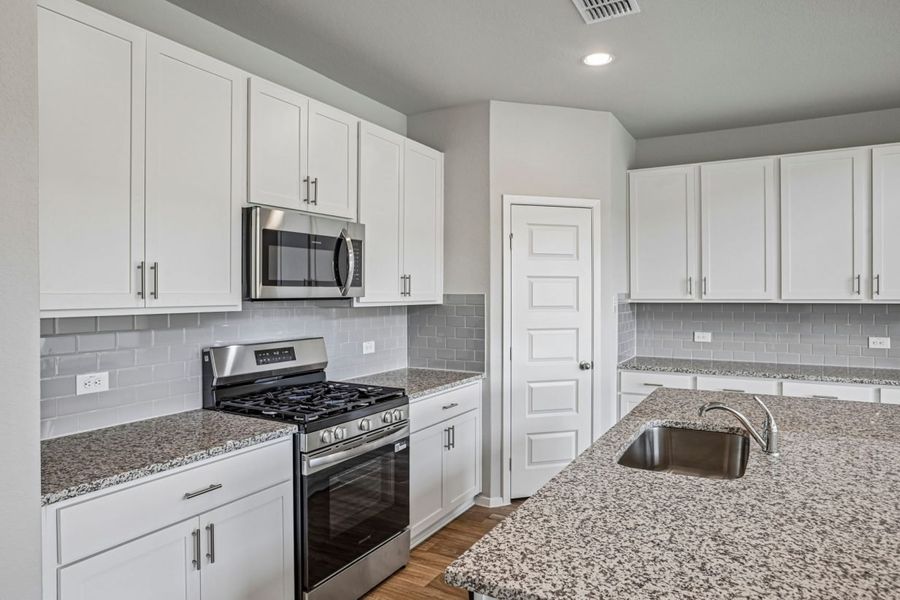 Furnished interior view inside a new home in Cloverleaf, Austin (Image 9).
