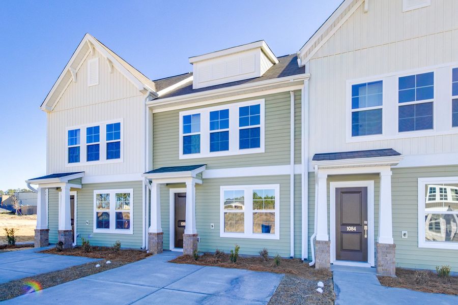 Front exterior of a new home in Astoria, Columbia, SC, highlighting curb appeal (Image 17).