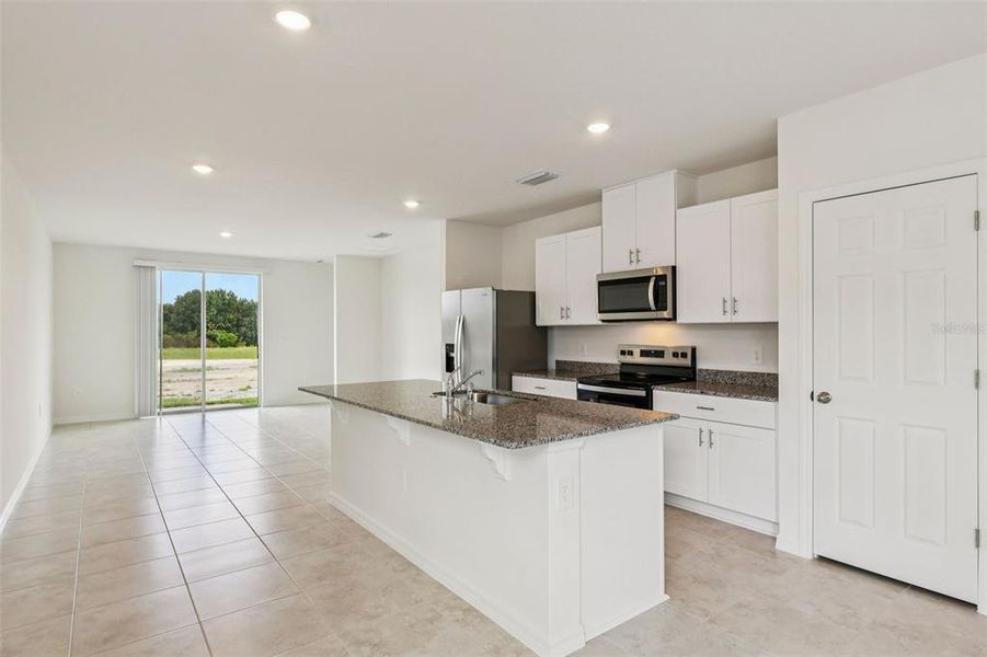 Furnished interior view inside a new home in Bradbury Creek - Classic Series, Haines City (Image 7).