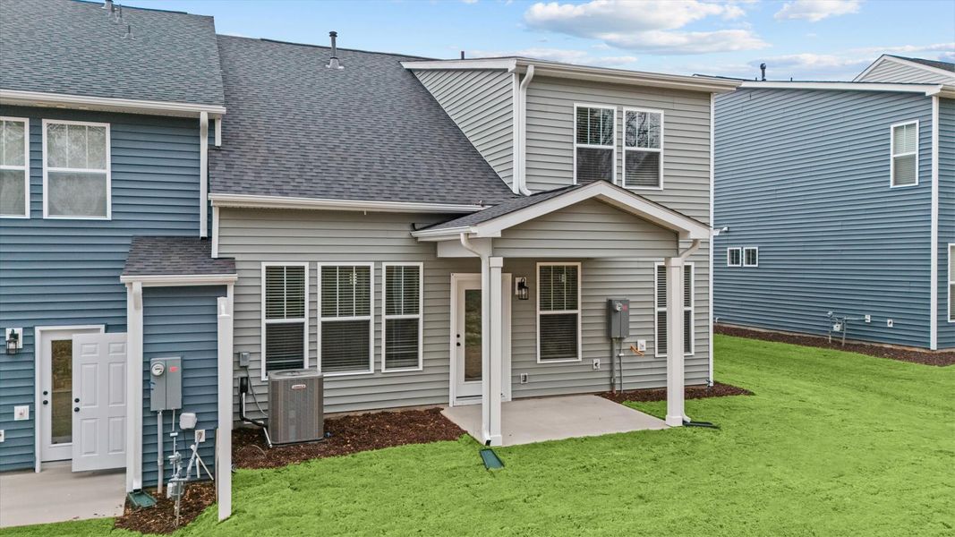 Rear covered porch offers a private, first-rate setting for outdoor enjoyment Rear covered porch offers a private, first-rate setting for outdoor enjoyment