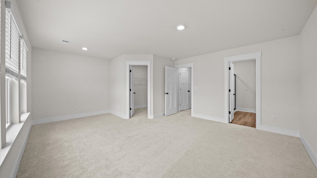 Spacious and serene primary suite with thoughtful design in a desirable DRB Homes community Spacious and serene primary suite with thoughtful design in a desirable DRB Homes community