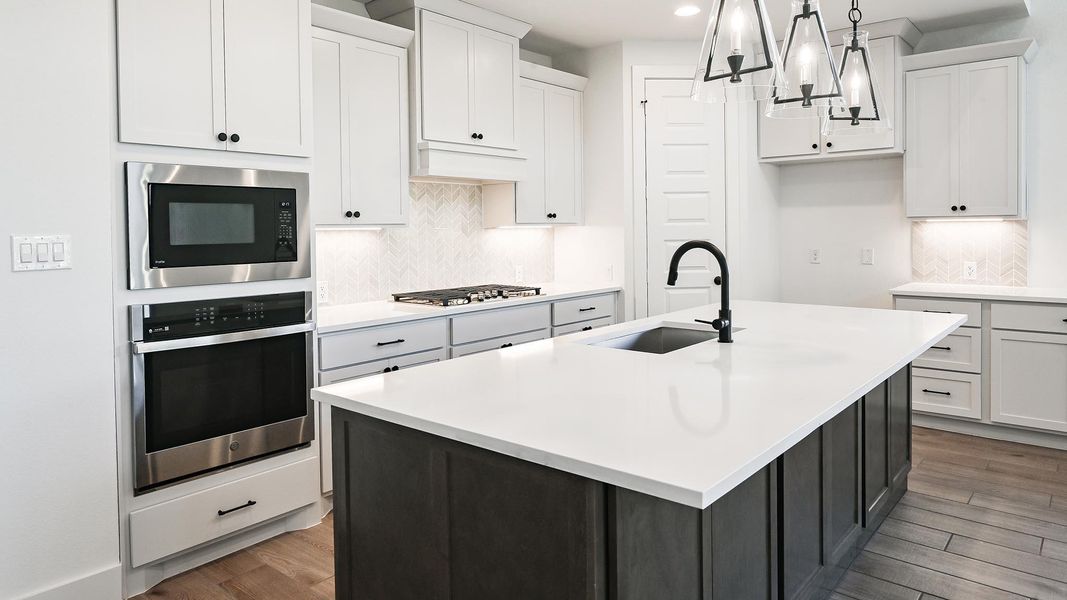 Furnished interior view inside a new home in 6 Creeks, Kyle (Image 10).