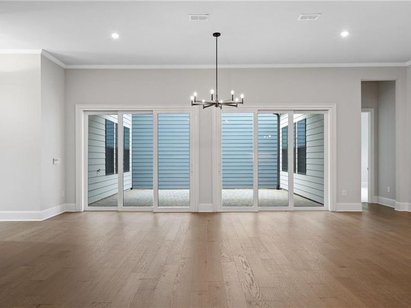 Spacious, unfurnished interior of a new home in The Village at Towne Lake, Woodstock (Image 59).