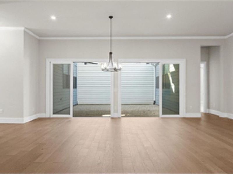 Spacious, unfurnished interior of a new home in The Village at Towne Lake, Woodstock (Image 23).