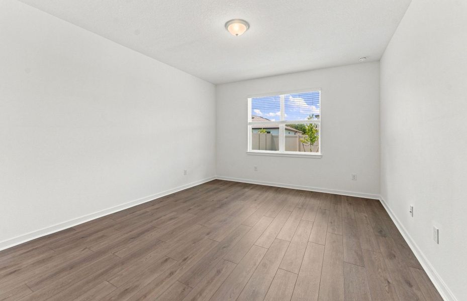 Spacious, unfurnished interior of a new home in Vida's Way, Wesley Chapel (Image 17).