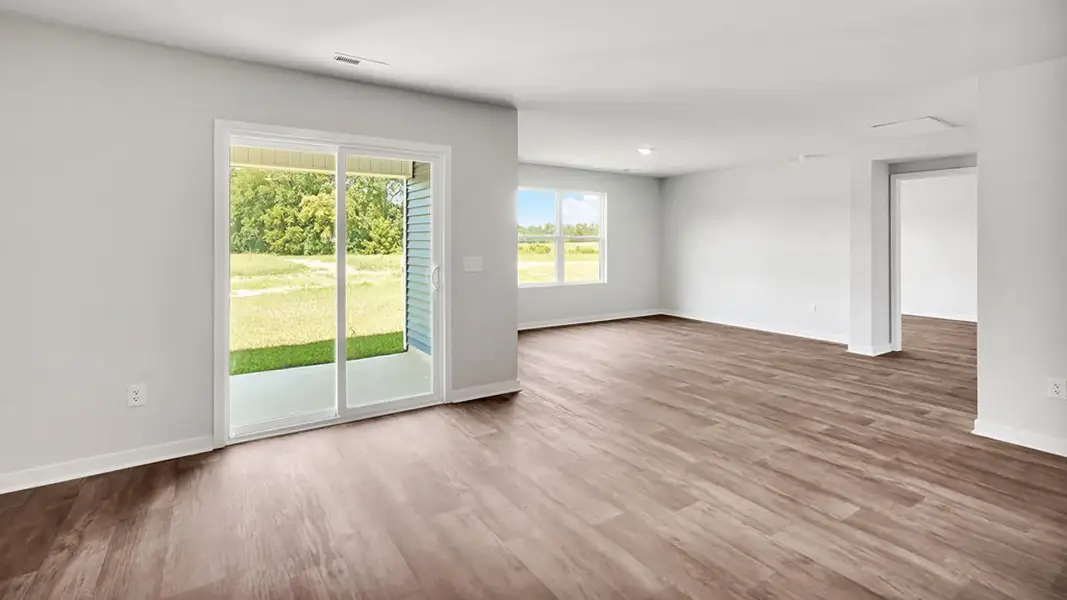 Representative unfurnished interior of a home built from the Cali by D.R. Horton in Caspian Ridge, Richlands (Image 9). Representative unfurnished interior of a home built from the Cali by D.R. Horton in Caspian Ridge, Richlands (Image 9).