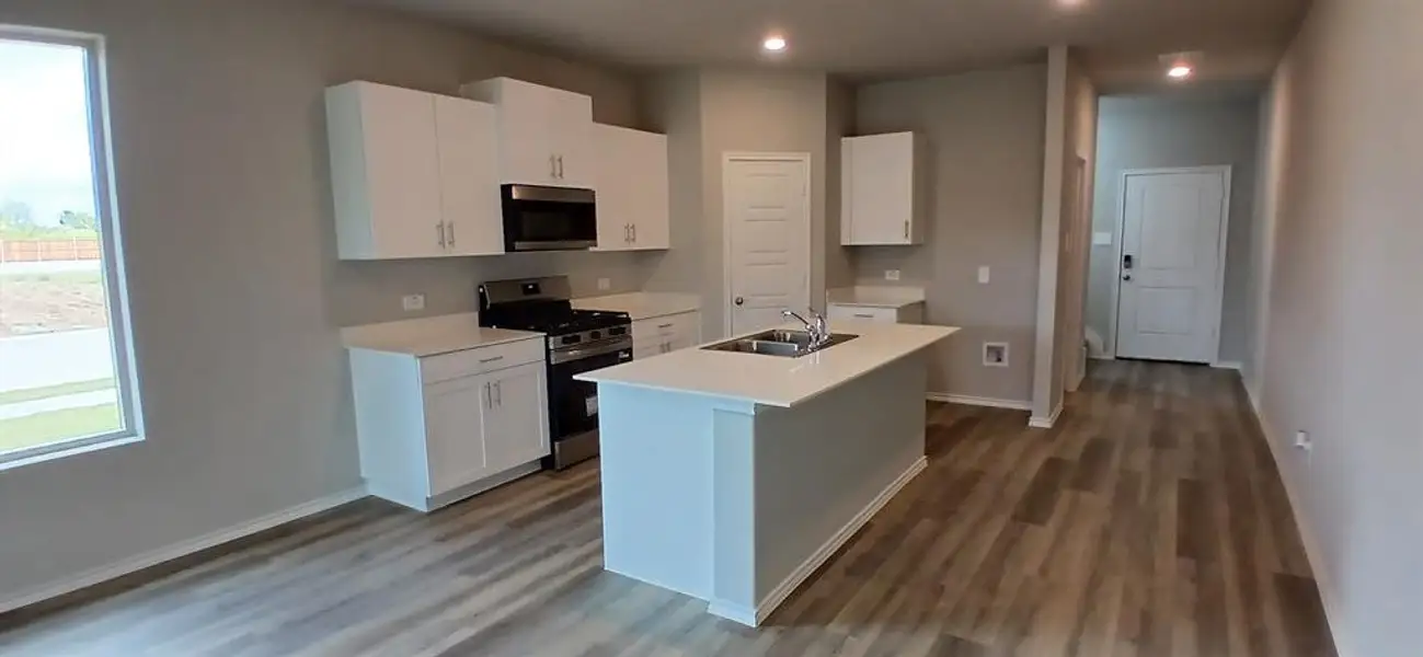 Kitchen - All Home and community information, including pricing, included features, terms, availability and amenities, are subject to change at any time without notice or obligation. All Drawings, pictures, photographs, video, square footages, floor plans, elevations, features, colors and sizes are approximate for illustration purposes only and will vary from the homes as built.