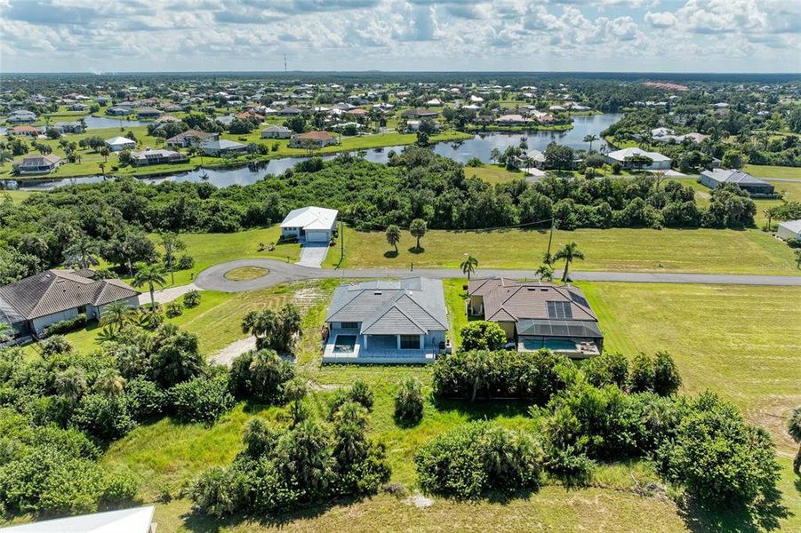 Aerial view with interior lakes and Charlotte Harbor in background. Aerial view with interior lakes and Charlotte Harbor in background.