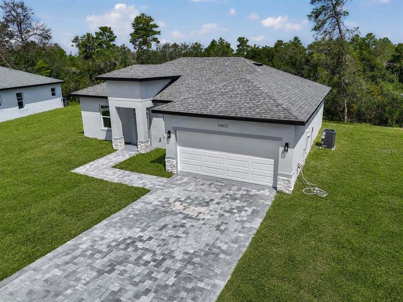 Front exterior of a new home in , Ocala, FL, highlighting curb appeal (Image 20).