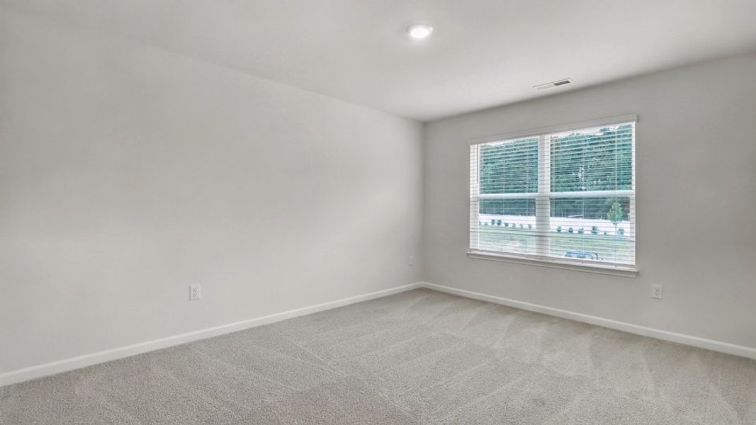 Spacious, unfurnished interior of a new home in The Townes at Honeycutt Oaks, Angier (Image 17).