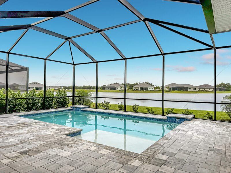Exterior details and patio area of a home in River Preserve Estates, Parrish (Image 31).