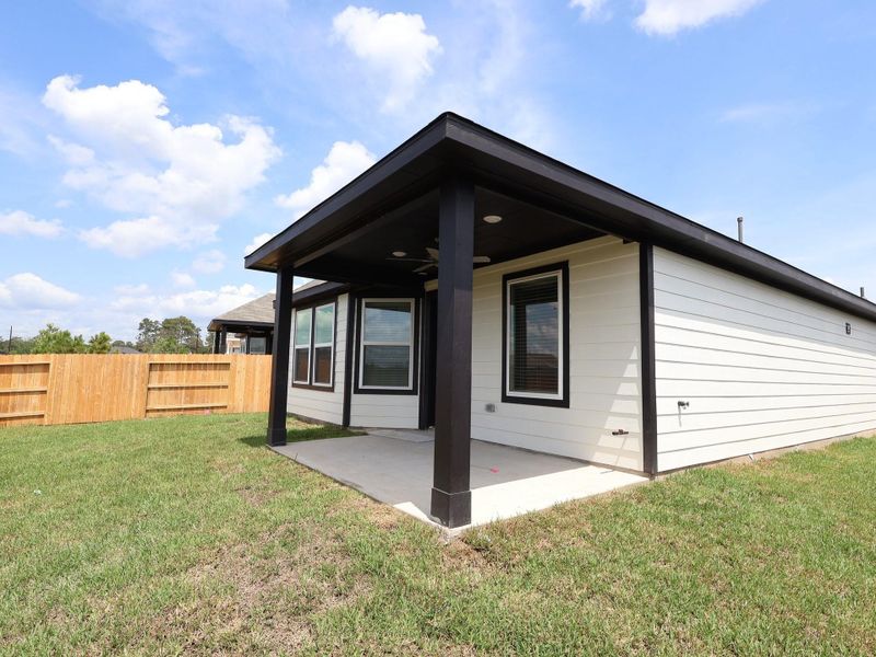 Front exterior of a new home in Magnolia Ridge, Magnolia, TX, highlighting curb appeal (Image 17). Front exterior of a new home in Magnolia Ridge, Magnolia, TX, highlighting curb appeal (Image 17).