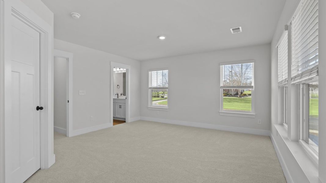 Elegant and functional primary suite in our reputable Hickory Heights community