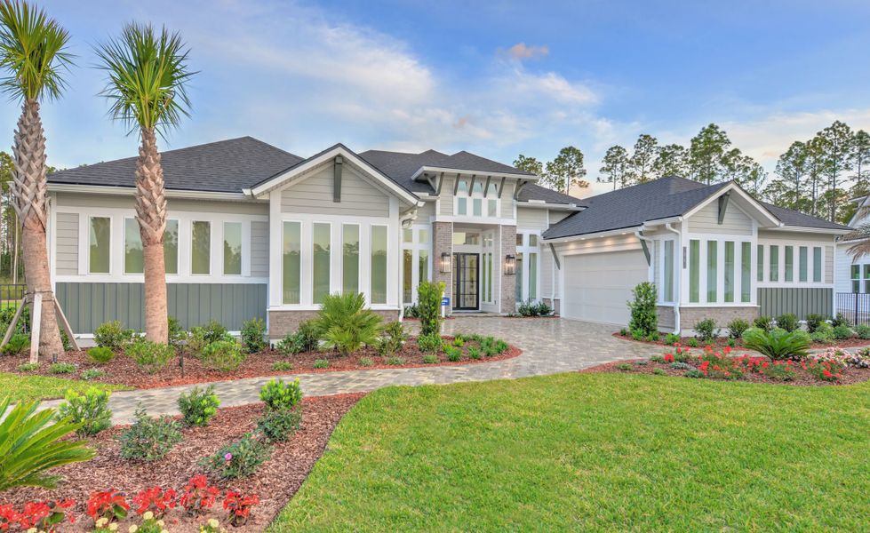 Front exterior of a new home in SilverLeaf, St. Augustine, FL, highlighting curb appeal (Image 21). Front exterior of a new home in SilverLeaf, St. Augustine, FL, highlighting curb appeal (Image 21).