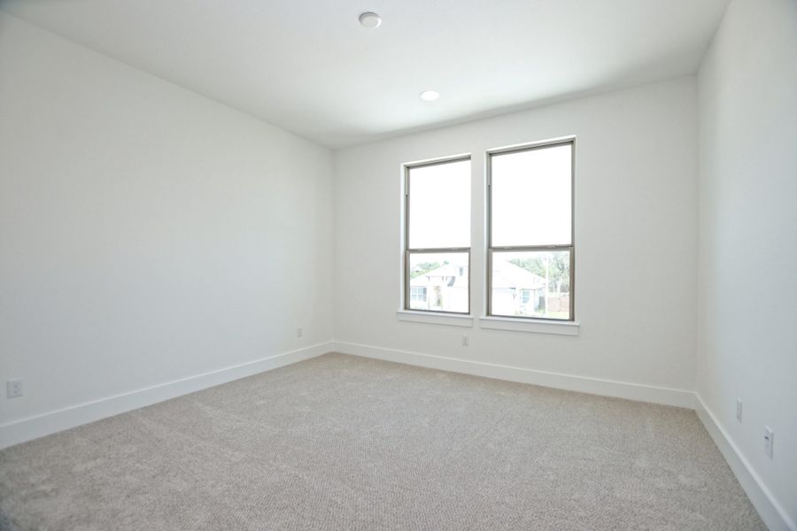 Representative unfurnished interior of a home built from the Topaz II by Giddens Homes in Riverstone, Georgetown (Image 126).