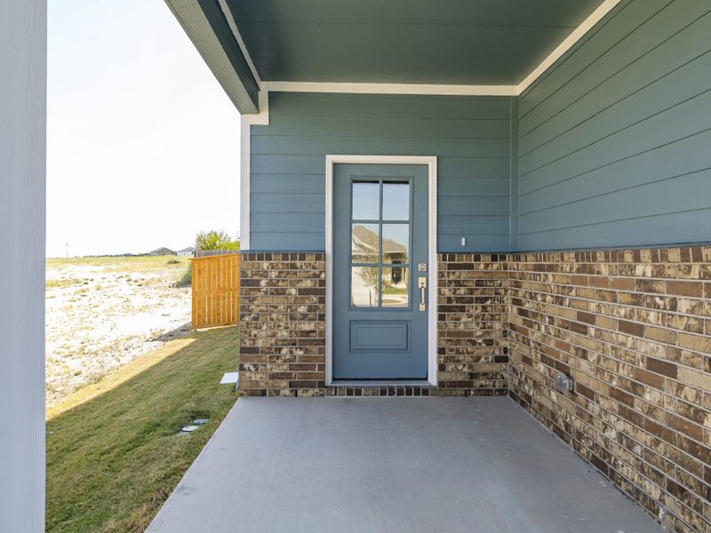 Exterior details and patio area of a home in Cool Water at Sonterra, Jarrell (Image 3).