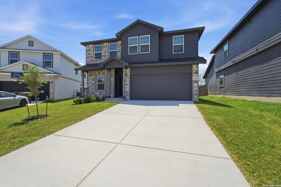 Front exterior of a new home in , San Antonio, TX, highlighting curb appeal (Image 17).