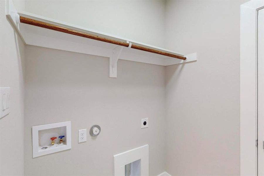 Laundry room featuring hookup for an electric dryer and washer hookup