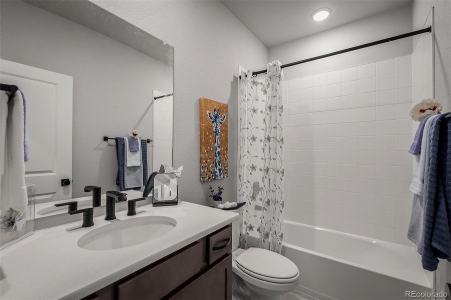 Furnished interior view inside a new home in Revel Crossing at Wolf Ranch – The Outlook Collection, Colorado Springs (Image 19).