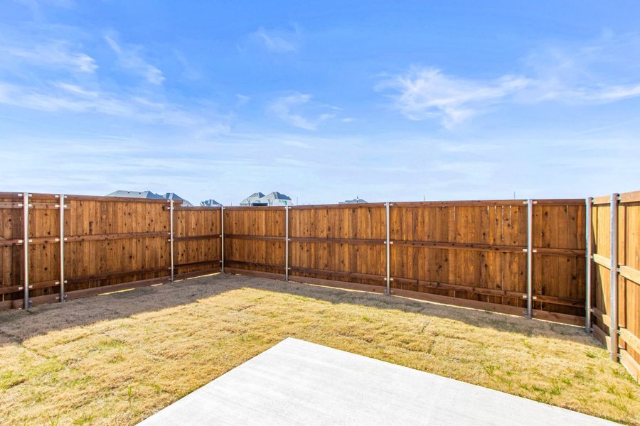 Exterior details and patio area of a home in Wildridge, Oak Point (Image 19).