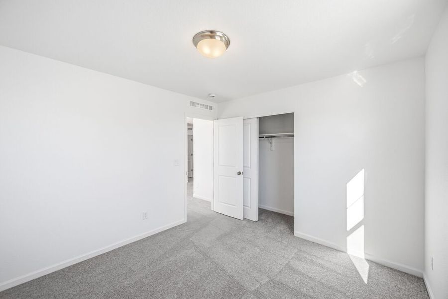 Spacious, unfurnished interior of a new home in The Town Collection at Independence, Elizabeth (Image 18).