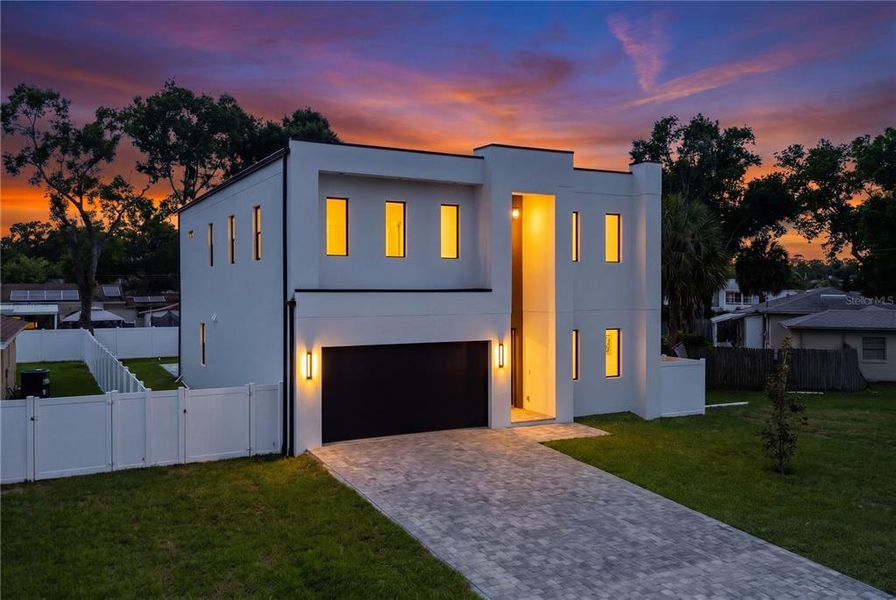 Front exterior of a new home in , Tampa, FL, highlighting curb appeal (Image 25).