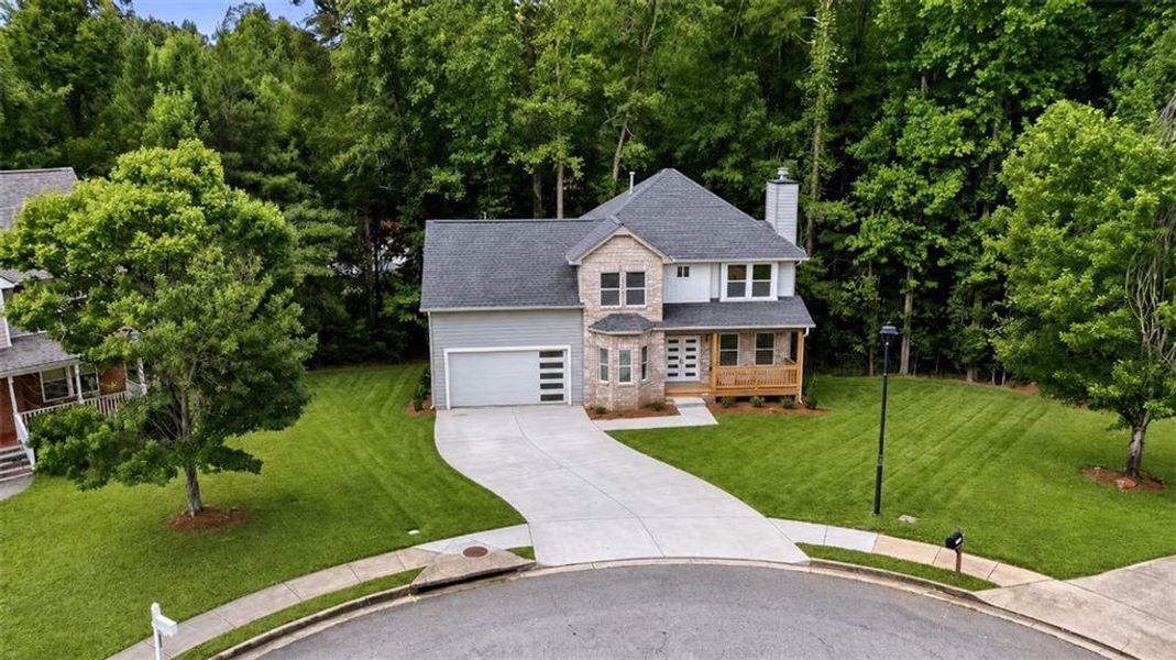 Front exterior of a new home in , Ellenwood, GA, highlighting curb appeal (Image 24).