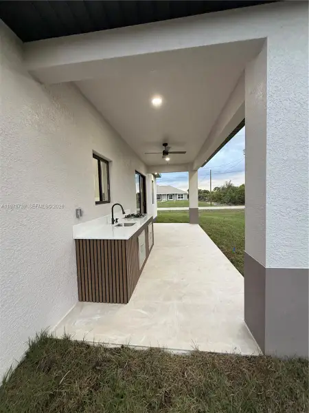 Exterior details and patio area of a home in , Lehigh Acres (Image 25).