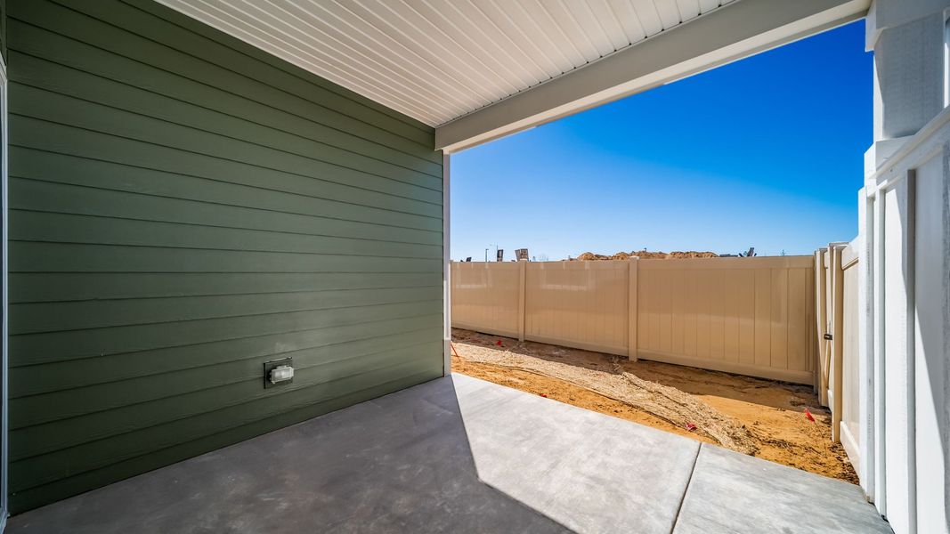 Exterior details and patio area of a home in The Reserve at Green Valley Ranch, Aurora (Image 17).