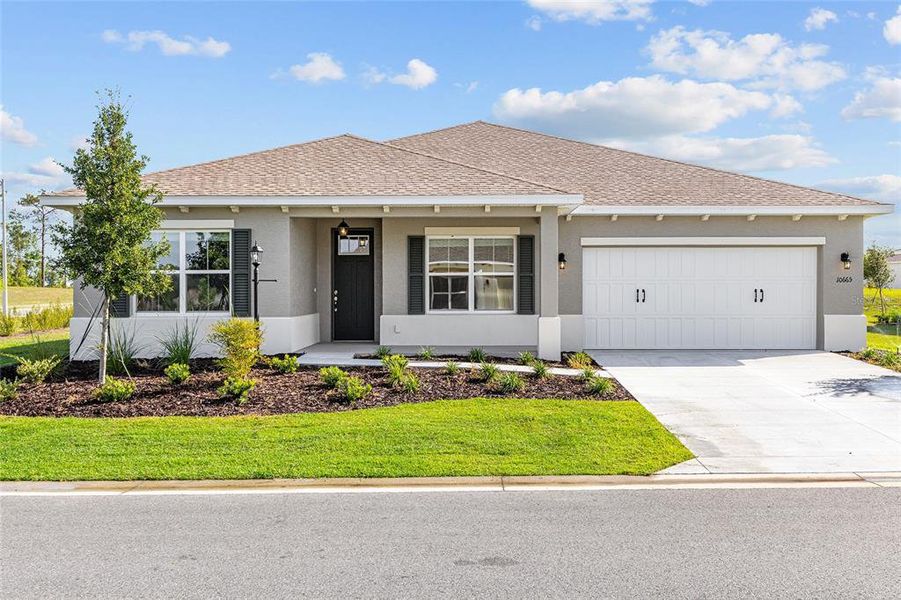 Front exterior of a new home in , Ocala, FL, highlighting curb appeal (Image 16). Front exterior of a new home in , Ocala, FL, highlighting curb appeal (Image 16).