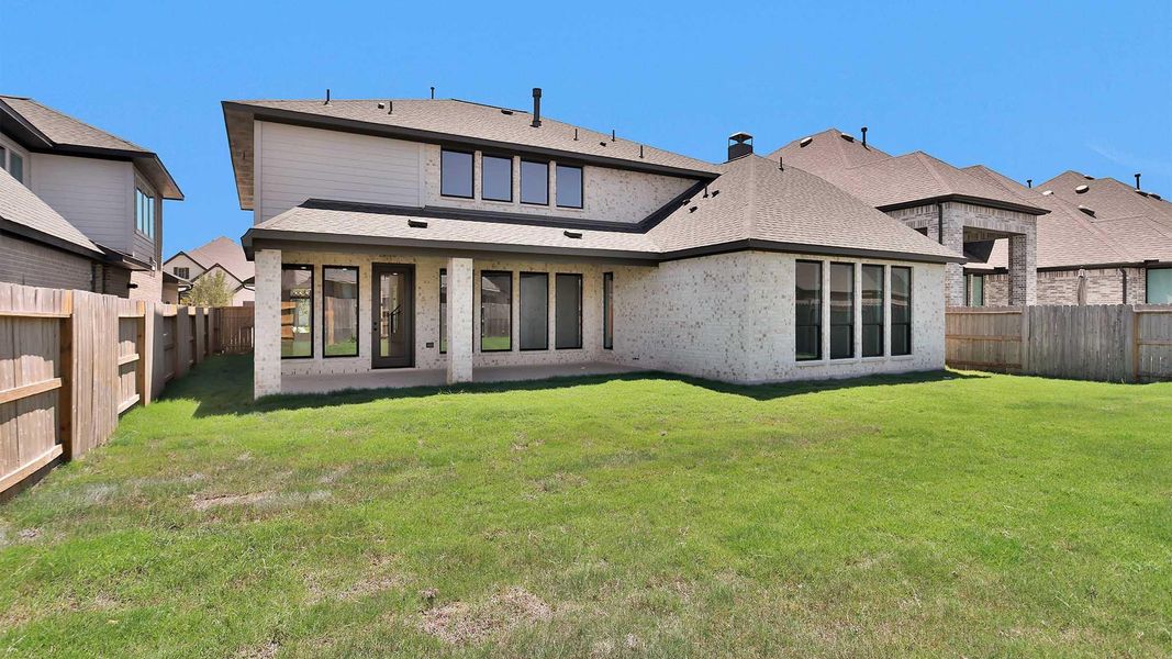 Exterior details and patio area of a home in Grange, Katy (Image 4).