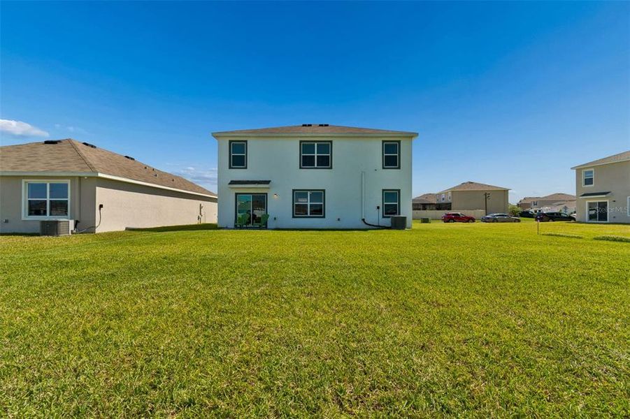 Exterior details and patio area of a home in Farm at Varrea, Plant City (Image 3).