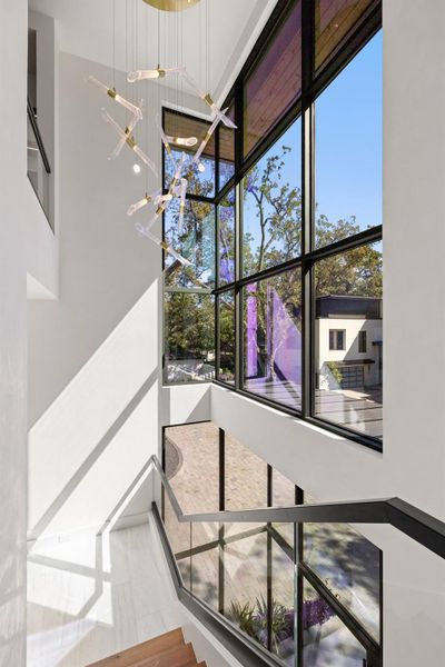 Staircase with a chandelier