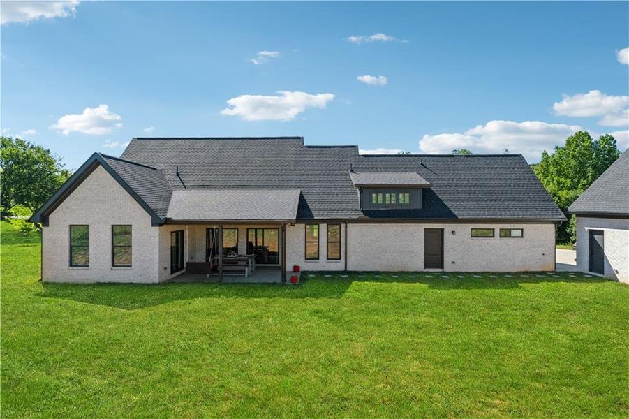 Front exterior of a new home in , Gainesville, GA, highlighting curb appeal (Image 2).