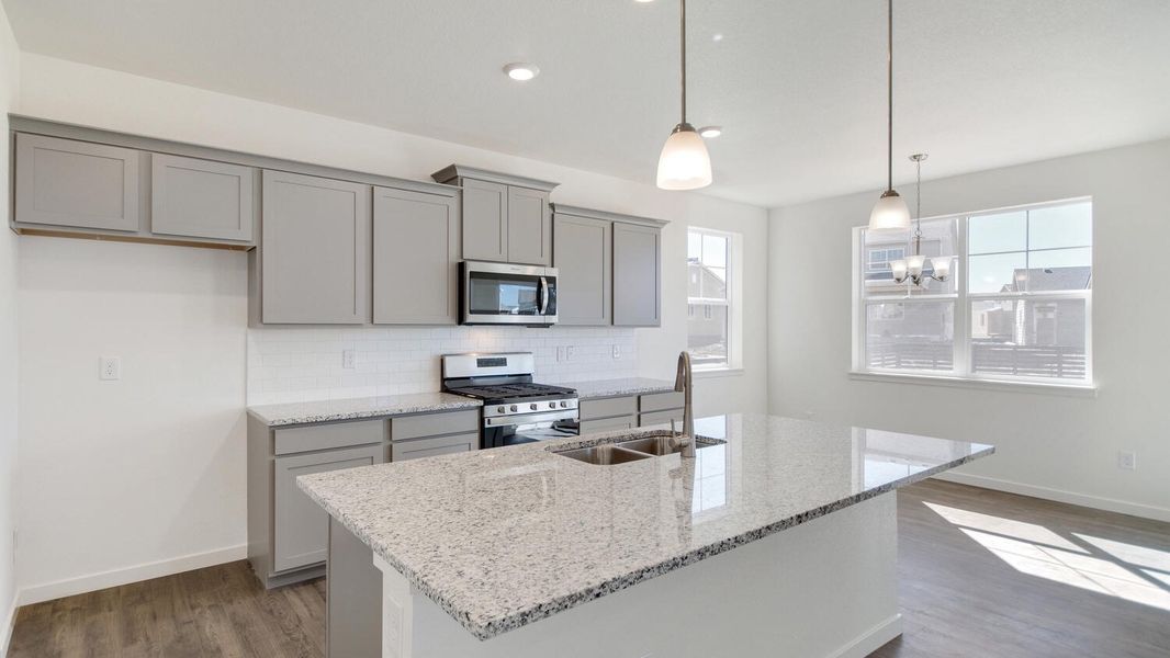 Furnished interior view inside a new home in Sky Ranch, Watkins (Image 3).