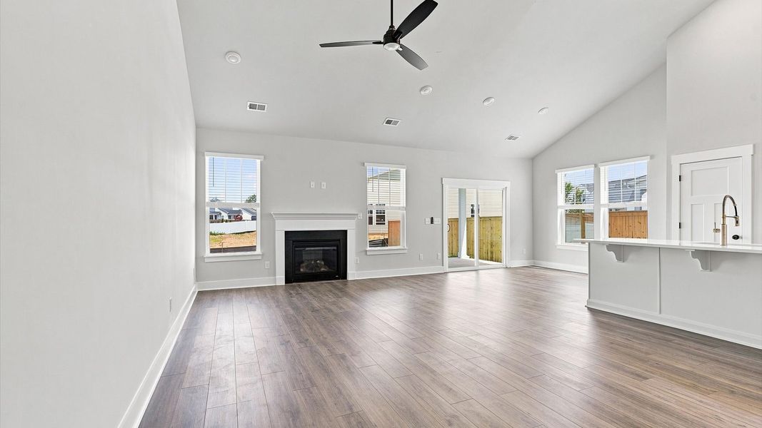 Highly skilled craftsmanship and modern elegance meet in this family room with soaring ceilings Highly skilled craftsmanship and modern elegance meet in this family room with soaring ceilings