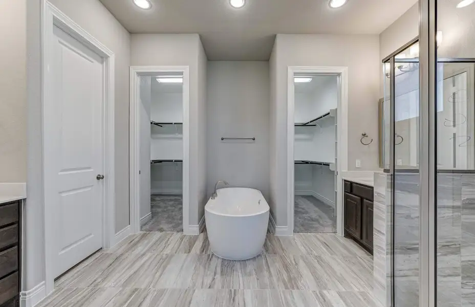 Representative furnished interior of a home built from the 3798 by Ravenna Homes in The Woodlands Hills 65′, Willis (Image 19).