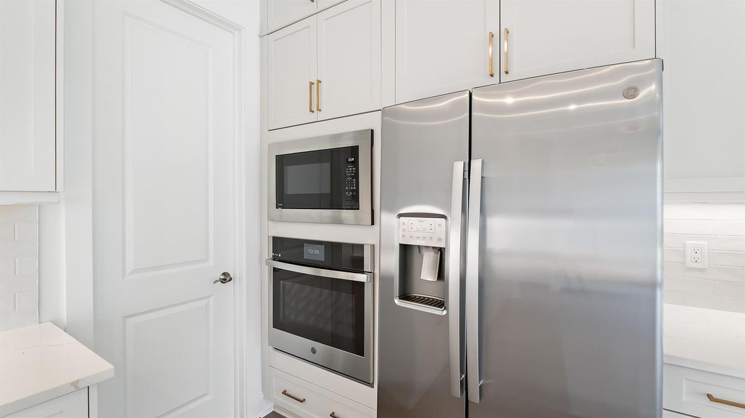 Furnished interior view inside a new home in L'Ambiance at Avenir, Palm Beach Gardens (Image 31).