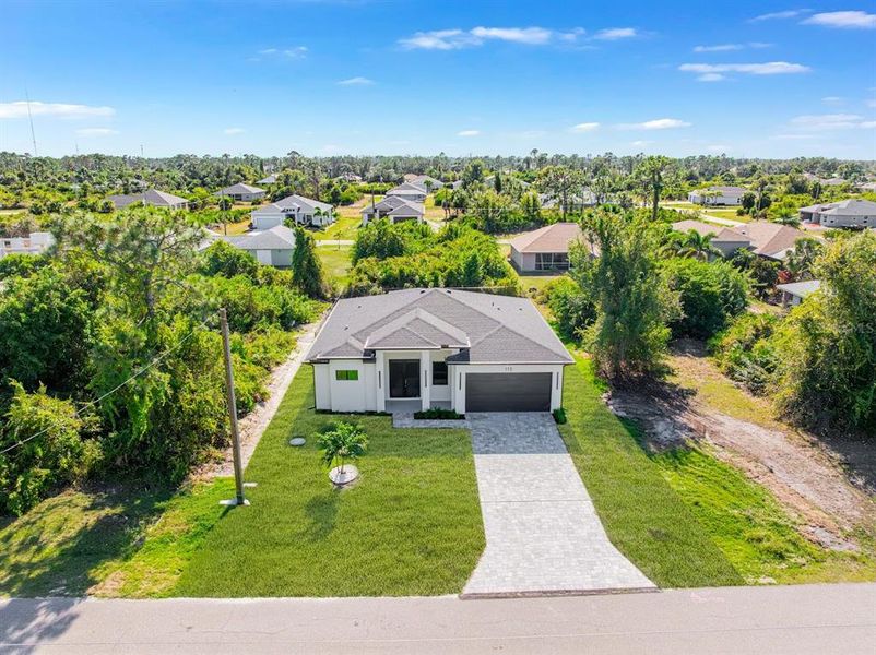 Front exterior of a new home in , Rotonda West, FL, highlighting curb appeal (Image 24).