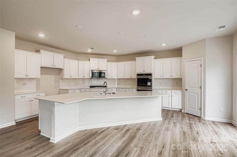 Furnished interior view inside a new home in Shannon Woods: Walk & Enclave, Maiden (Image 4).