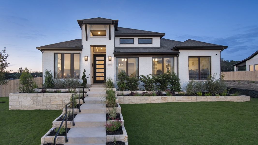 Front exterior of a new home in Juniper Springs, Lockhart, TX, highlighting curb appeal (Image 2). Front exterior of a new home in Juniper Springs, Lockhart, TX, highlighting curb appeal (Image 2).