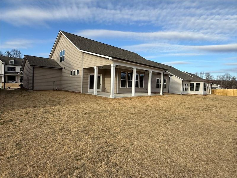 Exterior details and patio area of a home in Ponderosa Farms Reserve, Gainesville (Image 4).
