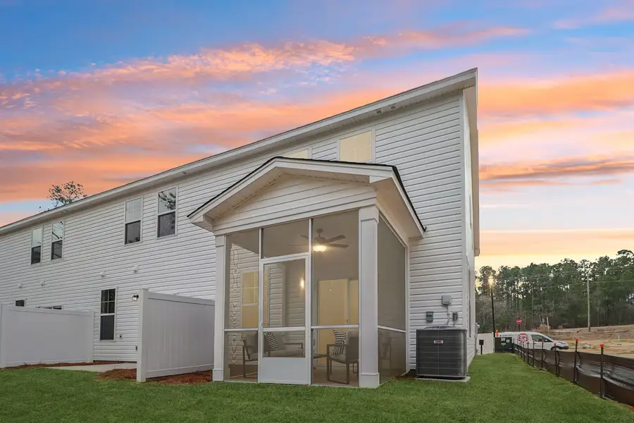 Exterior details and patio area of a home in Victorywoods Village Townhomes, Columbia (Image 2). Exterior details and patio area of a home in Victorywoods Village Townhomes, Columbia (Image 2).