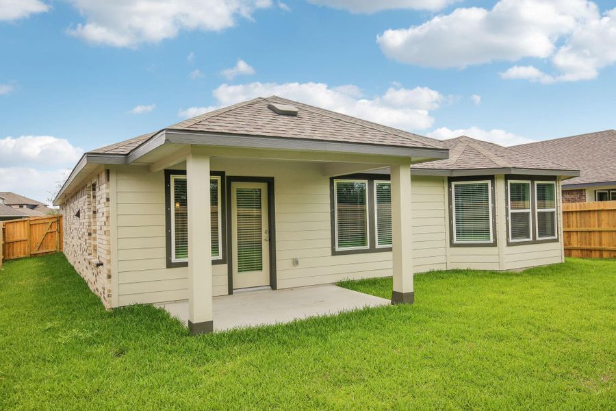Front exterior of a new home in Massey Oaks - Premier Series, Pearland, TX, highlighting curb appeal (Image 27). Front exterior of a new home in Massey Oaks - Premier Series, Pearland, TX, highlighting curb appeal (Image 27).