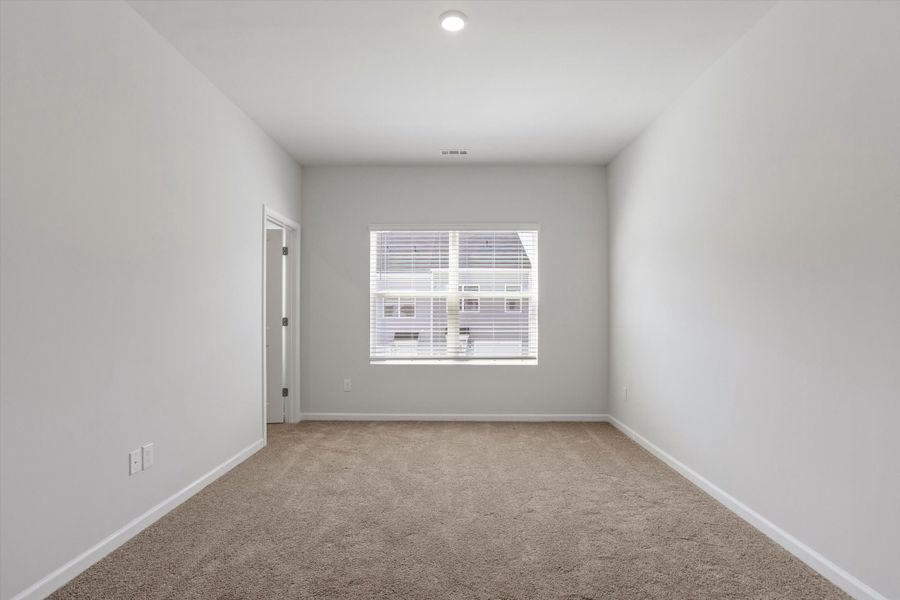 Spacious, unfurnished interior of a new home in Renaissance at White Oak, Garner (Image 16).