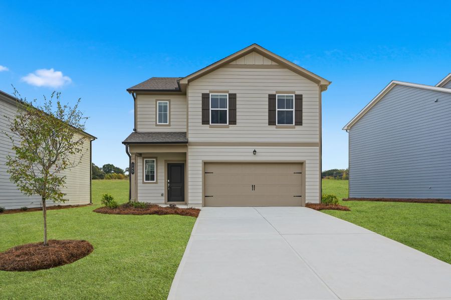 Front exterior of a new home in Crossvine Village, LaGrange, GA, highlighting curb appeal (Image 1).