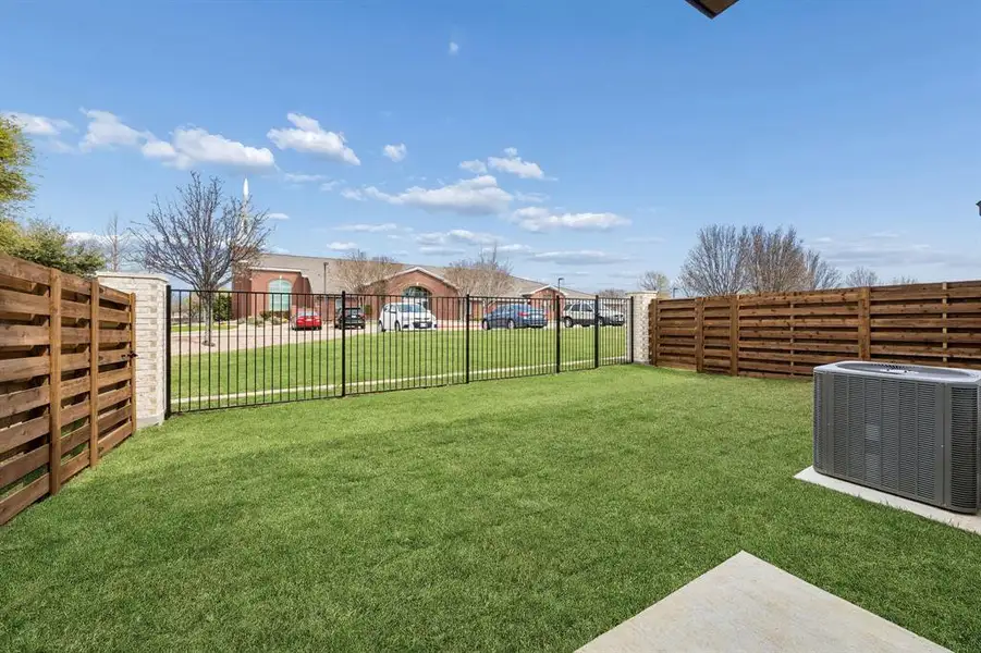 Exterior details and patio area of a home in The Apollo, Wylie (Image 3). Exterior details and patio area of a home in The Apollo, Wylie (Image 3).