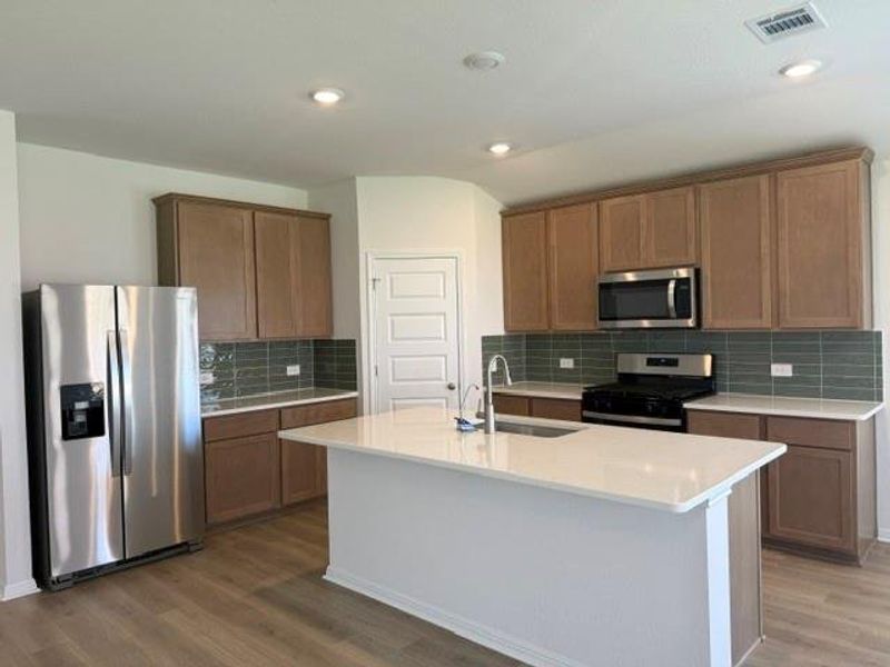Furnished interior view inside a new home in Butler Farms - Boulevard Collection, Liberty Hill (Image 4). Furnished interior view inside a new home in Butler Farms - Boulevard Collection, Liberty Hill (Image 4).